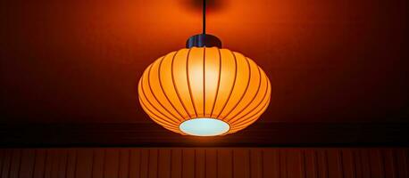 Ceiling mounted lamp in orange photo
