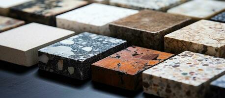 Close up samples of artificial stone for modern interior design in kitchens or bathrooms photo