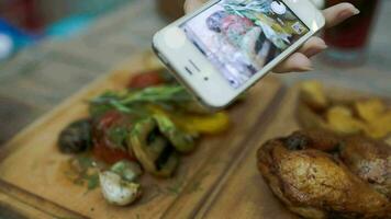 Taking picture of dish served in cafe video