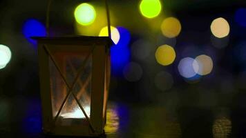 Outdoor lantern with lit candle video