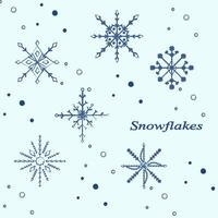 Set of charcoal snowflakes, isolated on a light blue background vector