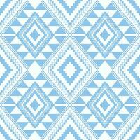 Aztec blue-white geometric pattern. Aztec geometric shape seamless pattern cross stitch style. Ethnic geometric stitch pattern use for textile, wallpaper, cushion, carpet, rug, upholstery, etc vector