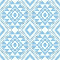 Aztec blue-white geometric pattern. Aztec geometric shape seamless pattern cross stitch style. Ethnic geometric stitch pattern use for textile, wallpaper, cushion, carpet, rug, upholstery, etc vector