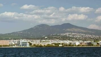 View of coastal city from sailing ship video