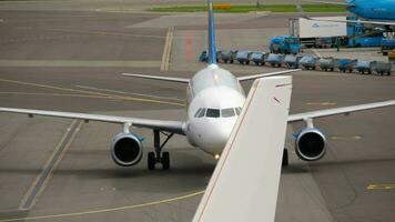 AMSTERDAM, THE NETHERLANDS JULY 29, 2017 - SmallPlanet Airlines Airbus A320 LY SPA taxiing after landing, flight CND620 from Rhodos, Shiphol Airport, Amsterdam, Holland video