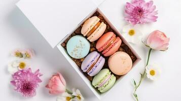 Colorful macaroons in present box with spring flowers on white background. AI Generative photo