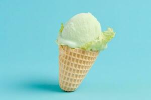 single scoop of ice cream in a crispy waffle cone on a vibrant blue background photo