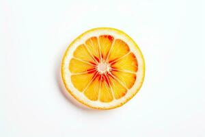 an orange fruit sliced in half on a plain white background photo