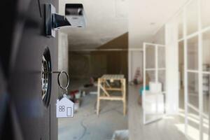 opened white door to modern living room interior photo