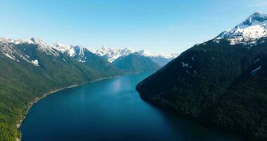 Aerial landscape view of Chilliwack Lake and mountains in spring. video