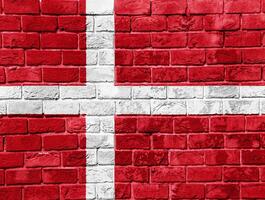 Flag of Denmark on a textured background. Concept collage. photo