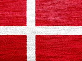 Flag of Denmark on a textured background. Concept collage. photo