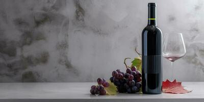 A bottle of wine and a glass with a bunch of grapes on a marble table top. Generative AI photo