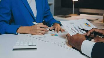 Team of business people working together in the meeting room office, teamwork background charts and graphs banner, double exposure successful teamwork,business planning concept. video