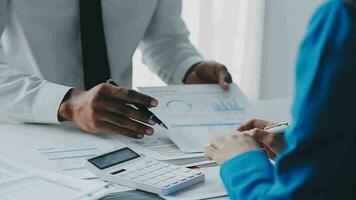 Team of business people working together in the meeting room office, teamwork background charts and graphs banner, double exposure successful teamwork,business planning concept. video