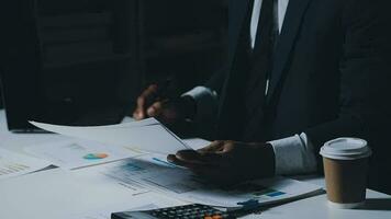 Team of business people working together in the meeting room office, teamwork background charts and graphs banner, double exposure successful teamwork,business planning concept. video