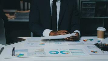 Team of business people working together in the meeting room office, teamwork background charts and graphs banner, double exposure successful teamwork,business planning concept. video