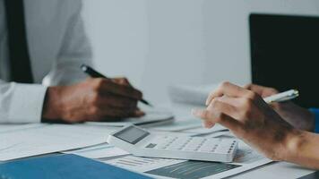 Team of business people working together in the meeting room office, teamwork background charts and graphs banner, double exposure successful teamwork,business planning concept. video
