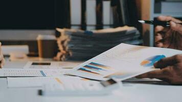 Team of business people working together in the meeting room office, teamwork background charts and graphs banner, double exposure successful teamwork,business planning concept. video