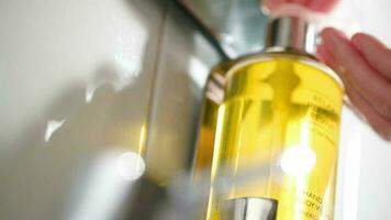 close up shot of pushing a container with liquid soap video