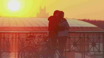Couple enjoying scenic sunset in the city video