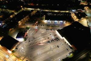 Aerial View of Illuminated Downtown Buildings, Roads and Central Luton City of England UK at Beginning of Clear Weather Night of September 5th, 2023 photo