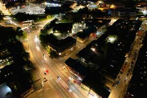 Aerial View of Illuminated Downtown Buildings, Roads and Central Luton City of England UK at Beginning of Clear Weather Night of September 5th, 2023 photo