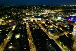 Aerial View of Illuminated Downtown Buildings, Roads and Central Luton City of England UK at Beginning of Clear Weather Night of September 5th, 2023 photo