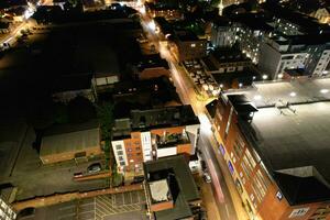 Aerial View of Illuminated Downtown Buildings, Roads and Central Luton City of England UK at Beginning of Clear Weather Night of September 5th, 2023 photo