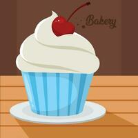 Isolated cupcake with cherry Bakery product on a table Vector