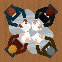 Group of businessmen around a desk Teamwork concept Vector