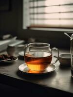 ai generativo té en claro vaso taza y tetera en de madera tablero con teléfono y cuaderno foto