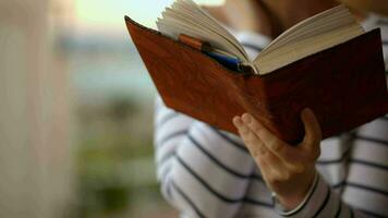 Day-dreamer with book in hands video