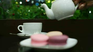 Tea with macaroons in cafe video