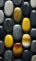 Some colorful stones are displayed, dark navy and yellow, AI Generative photo