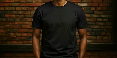 Blank black tee Handsome man, brick wall background, modern look AI Generated photo