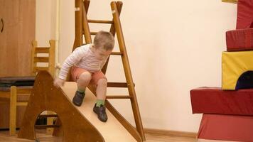 Boy playing in the nursery video