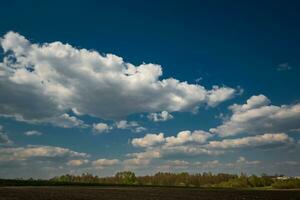 blue sky background with white striped clouds in heaven and infinity may use for sky replacement photo