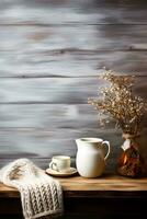 A rustic wooden table adorned with vintage knitted sweaters and mugs of steaming cocoa background with empty space for text photo