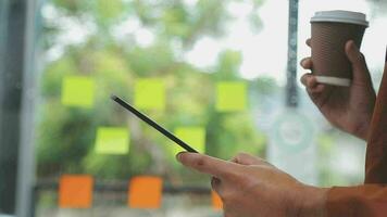 Financial analysts analyze business financial reports on a digital tablet planning investment project during a discussion at a meeting of corporate showing the results of their successful teamwork. video