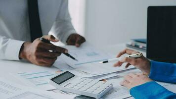 Team of business people working together in the meeting room office, teamwork background charts and graphs banner, double exposure successful teamwork,business planning concept. video