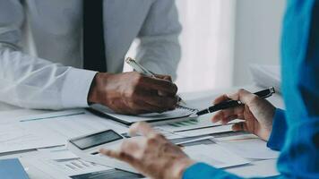 Team of business people working together in the meeting room office, teamwork background charts and graphs banner, double exposure successful teamwork,business planning concept. video