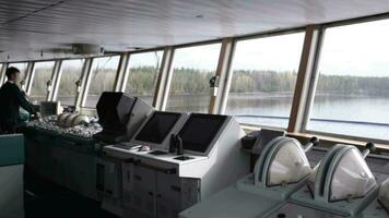 Navigation officer driving cruise liner on the river video