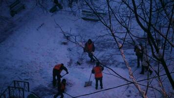 Street cleaners in orange uniform video