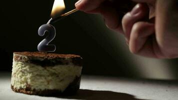 Candle two in tiramisu cake video