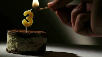 Candle three in tiramisu cake video