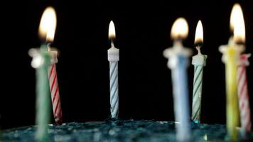 Candles rotation on black background video