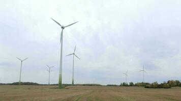 Many wind turbines in the field video