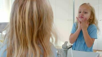 Little girl washing her face video