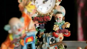 Clowns statuettes Montage with many different shots Clock video